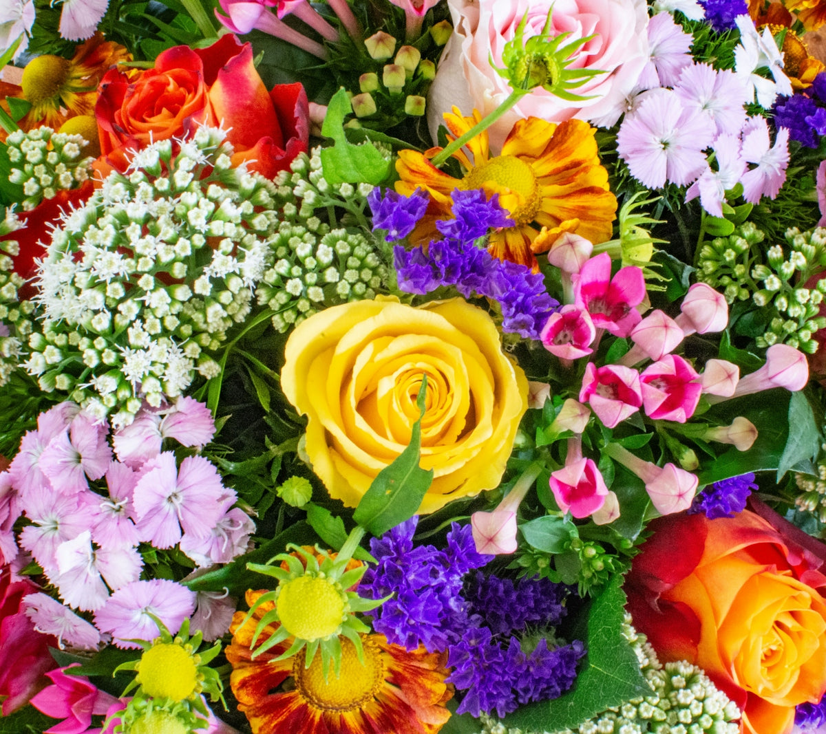 A bunch of flowers that are sitting on a table
