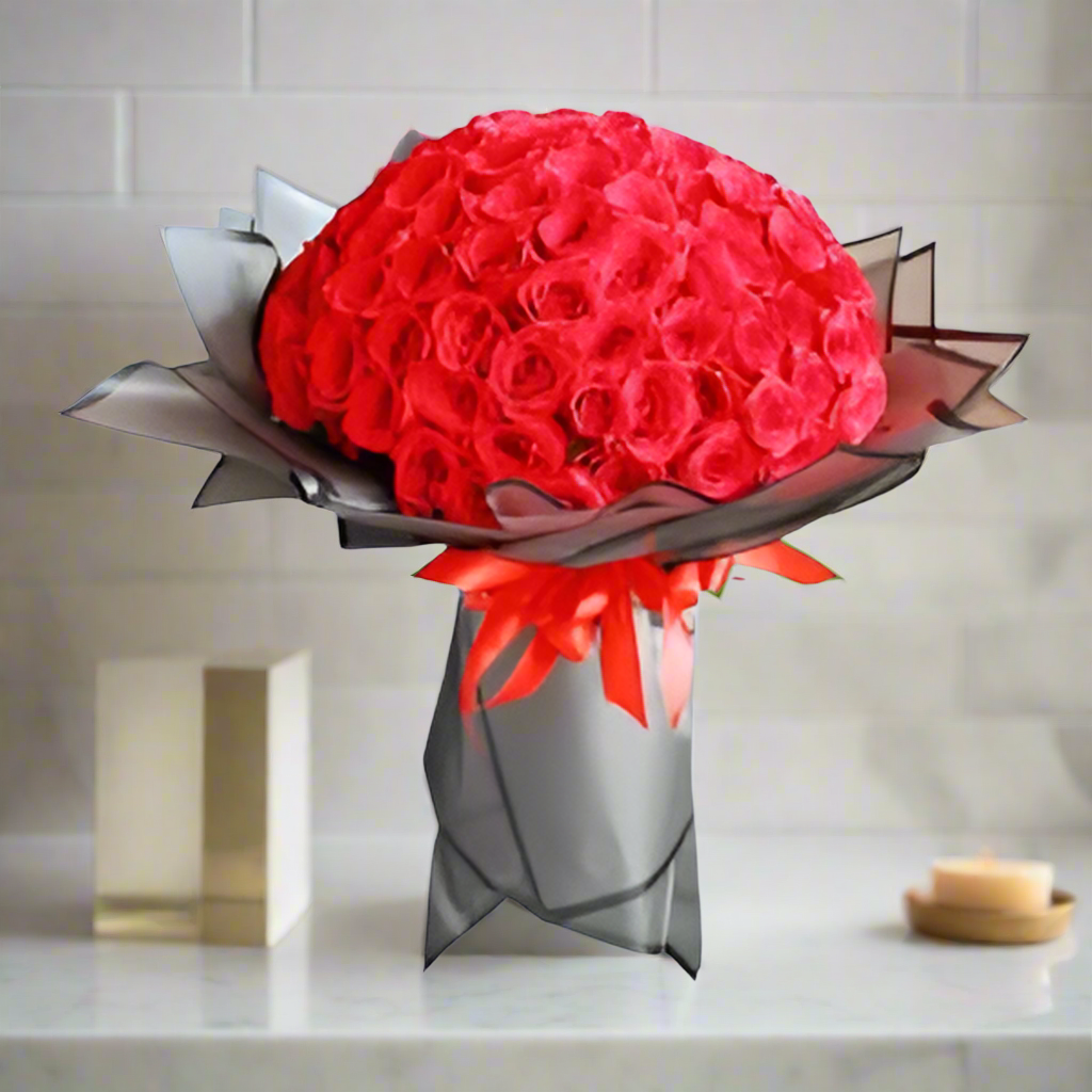 Elegant 100 Red Roses Bouquet arranged beautifully in a stylish black and red wrap