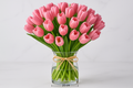 30 pink tulips in 25cm clear glass vase