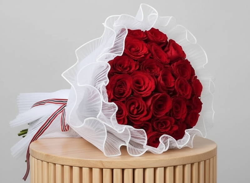Bouquet of 25 red roses with white ruffled wrap