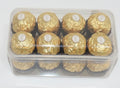 Box of Ferraro Rocher chocolates on a white background