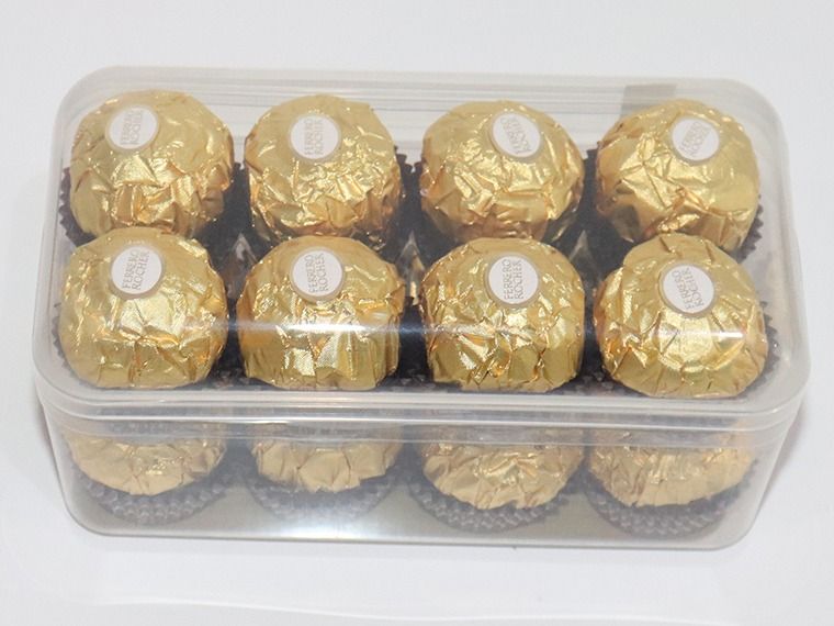 Box of Ferraro Rocher chocolates on a white background