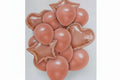 Collection of rose gold balloons including heart and star shapes