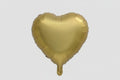 Gold heart-shaped balloon