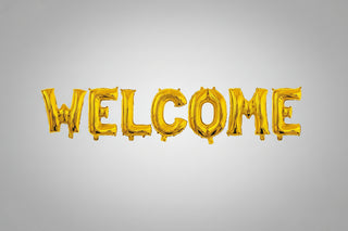 Gold 'WELCOME' balloon letters