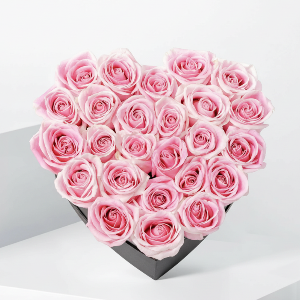 Heart-shaped arrangement of pink roses