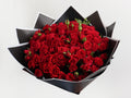 Hand bouquet baby roses red