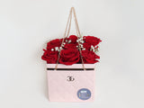 Pink Bag Red Roses — same-day flower delivery in Kuwait