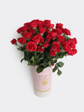pink vase red baby roses