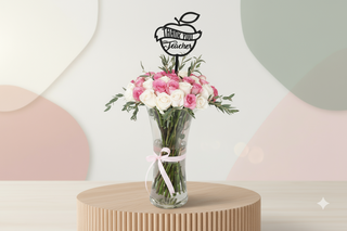 Bouquet of flowers in a vase with a 'Thank You Teacher' sign on a light background