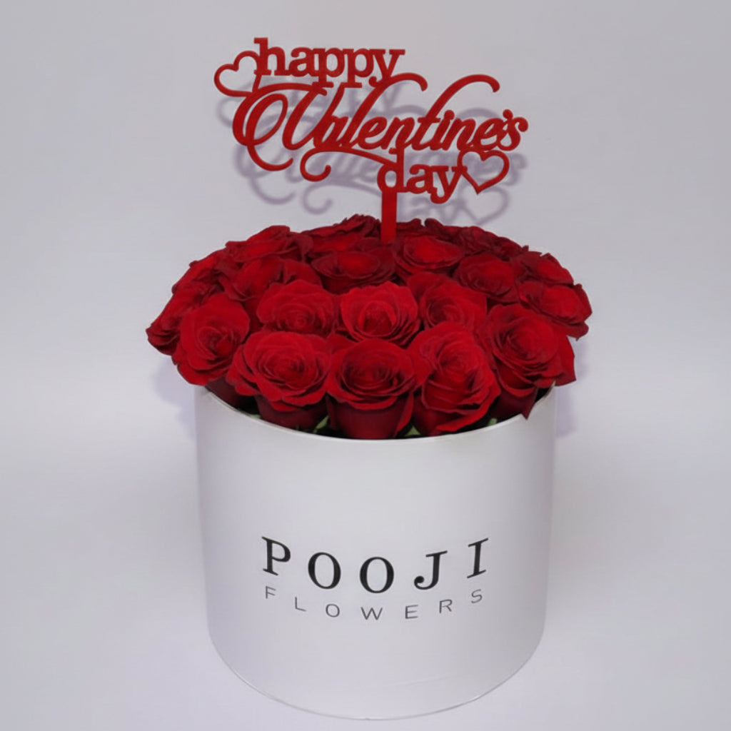 White box of red roses with 'Happy Valentine's Day' topper