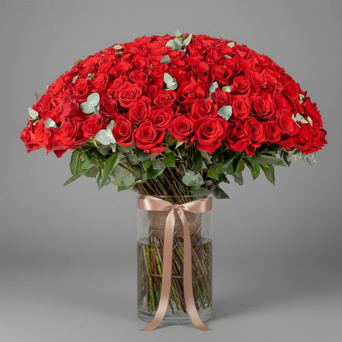 Red Roses in Glass Vase