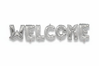 Silver 'WELCOME' balloon letters