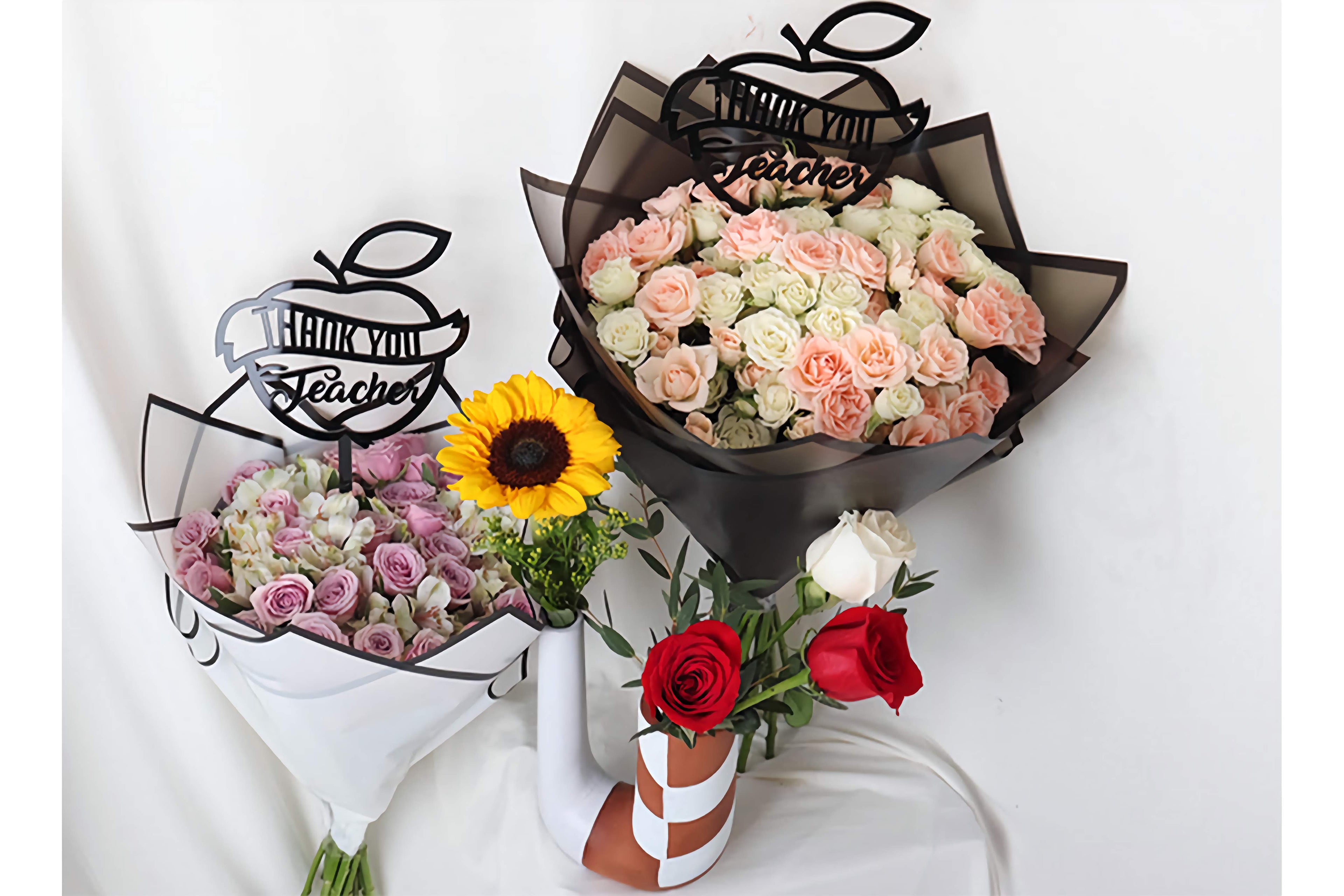 Three flower bouquets with 'Thank you Teacher' signs on a white background