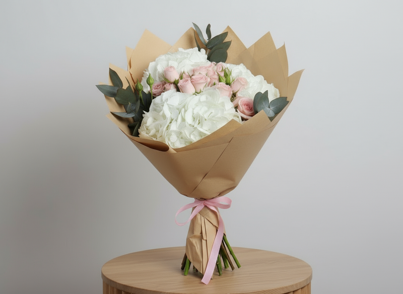 White Hydrangea &amp; Peach Rose Hand Bouquet — same-day flower delivery in Kuwait