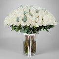 White Roses in Glass Vase