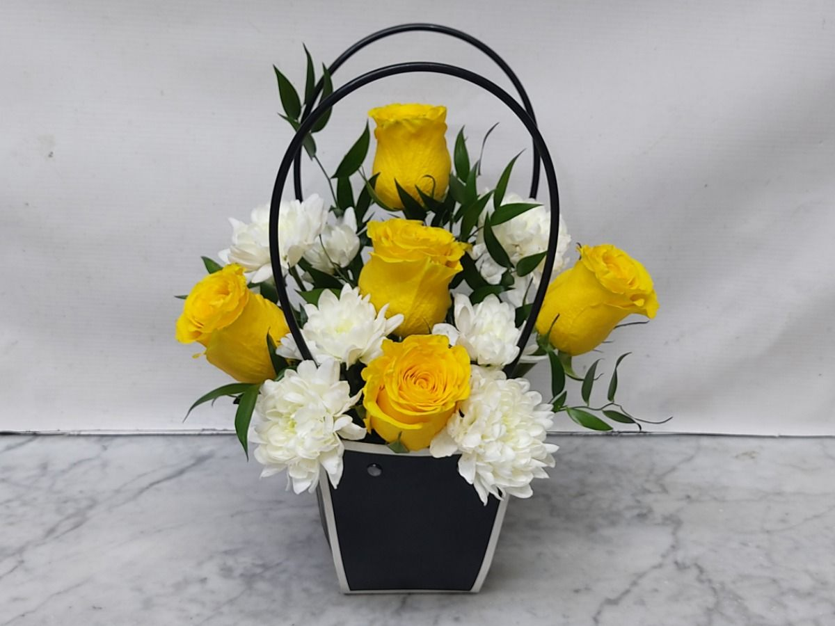 Yellow Rose Arrangement in Black Bag