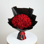 Alternate angle view of luxury red roses bouquet