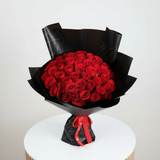 Alternate angle view of luxury red roses bouquet