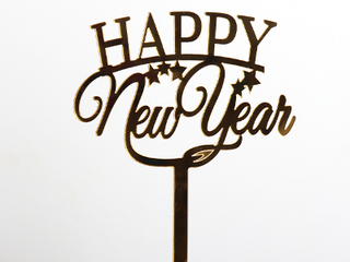 Happy New Year cake topper on a white background