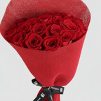 Close-up of red roses in red mesh wrapping