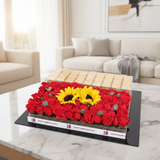 Gold chocolates tray with fresh flowers in elegant living room