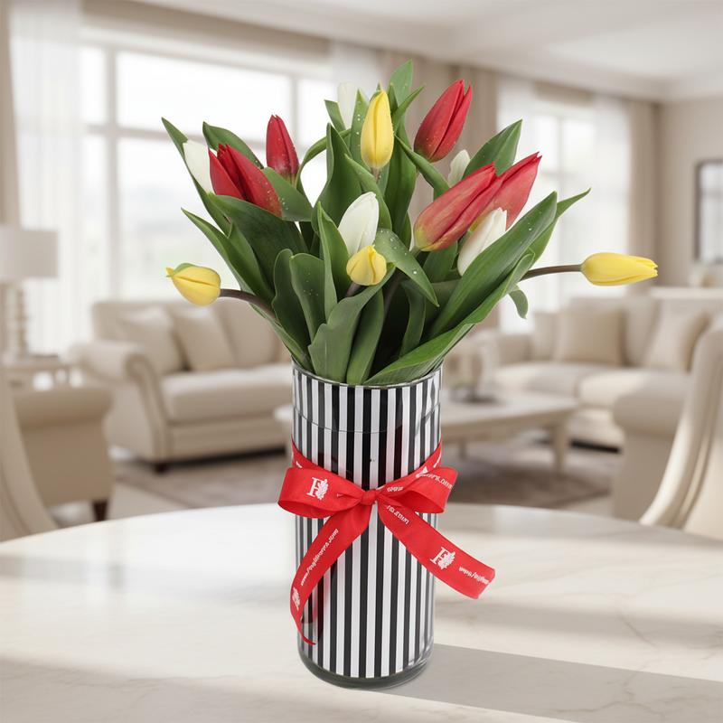 Mixed tulip hand bouquet in elegant home