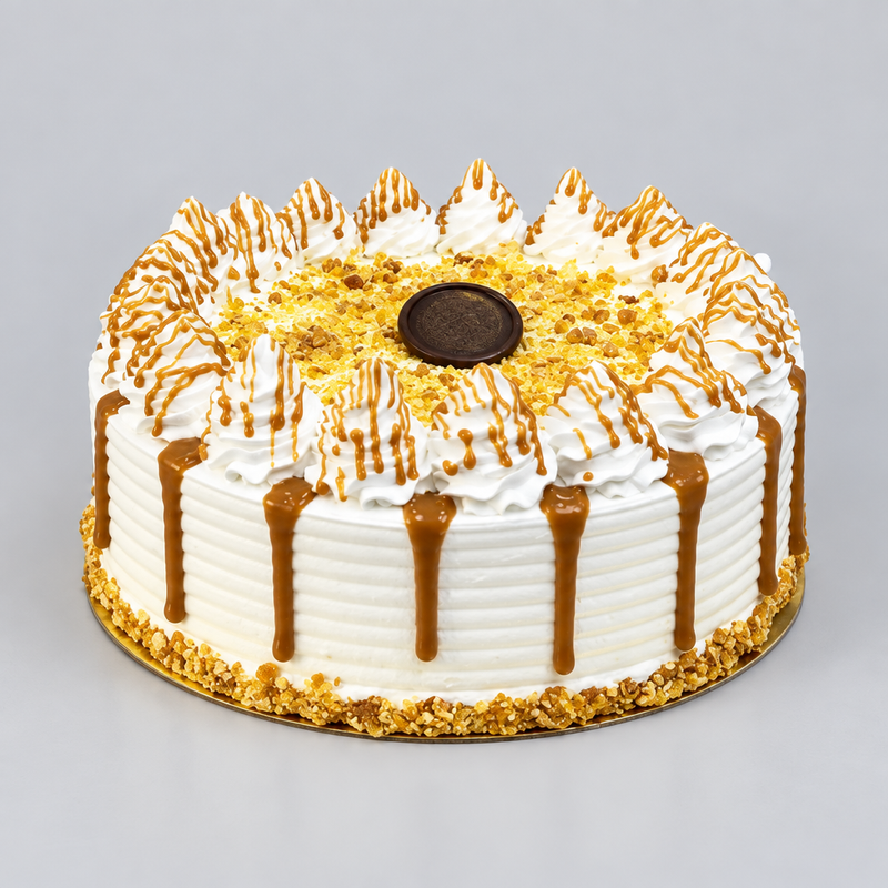 Butterscotch cake side view with caramel drips