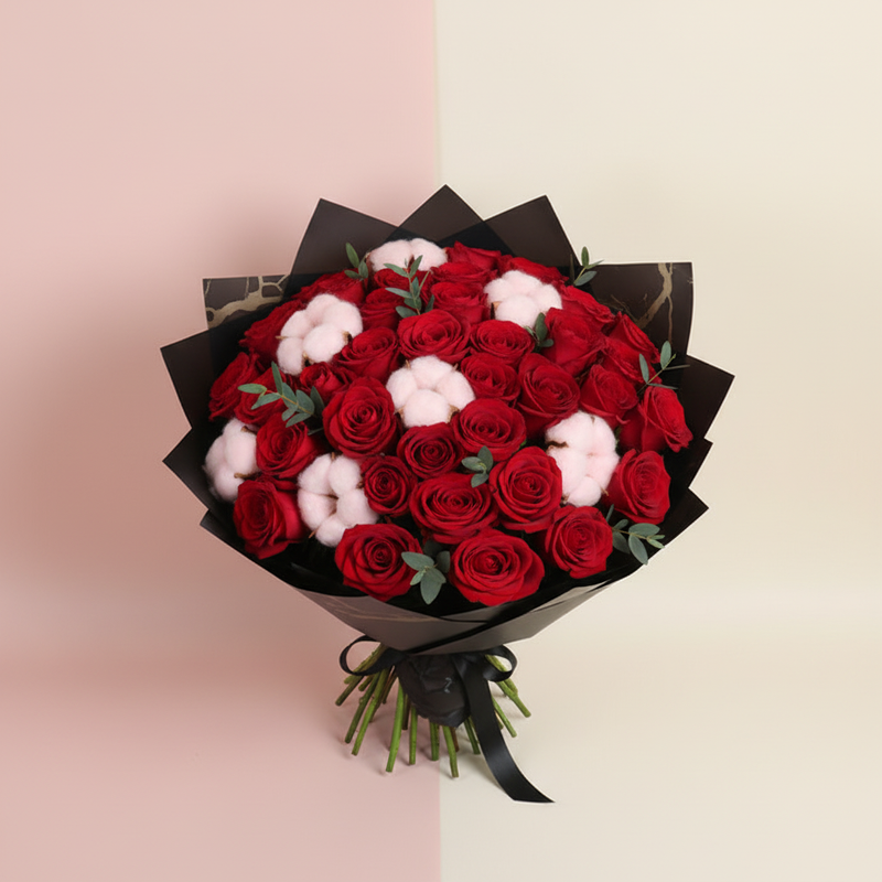 Top-down view of Mother Red Roses With Pink Cotton bouquet