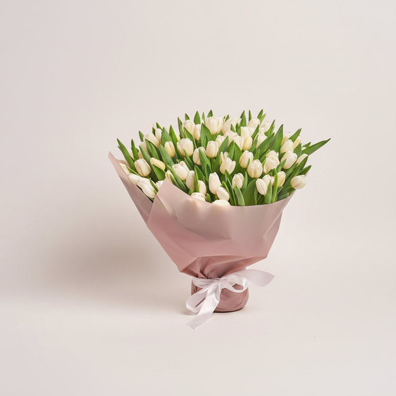 Alternate angle of 50 fresh white tulips bouquet