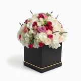 Alternate angle of colorful seasonal flower bouquet