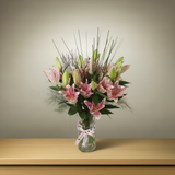 Close-up of fresh Oriental lily blooms and foliage