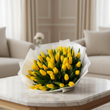 30 fresh yellow tulips bouquet in elegant home