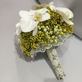 Yellow gypsophila and white Phalaenopsis orchid bridal bouquet three-quarter view
