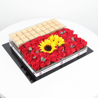 Alternate angle of gold chocolates tray with roses and sunflowers