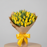 Fresh yellow tulip hand bouquet