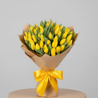 Fresh yellow tulip hand bouquet