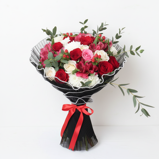 Alternate angle of fresh mixed Mother’s Day bouquet