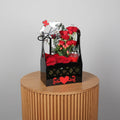 Beautiful Lovebirds & Roses arrangement in a decorative black box for romantic occasions