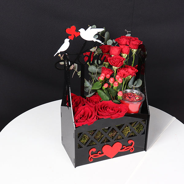 Beautiful Lovebirds & Roses arrangement in a decorative black box for romantic occasions