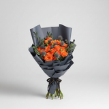 Orange mixed bouquet on light-gray background