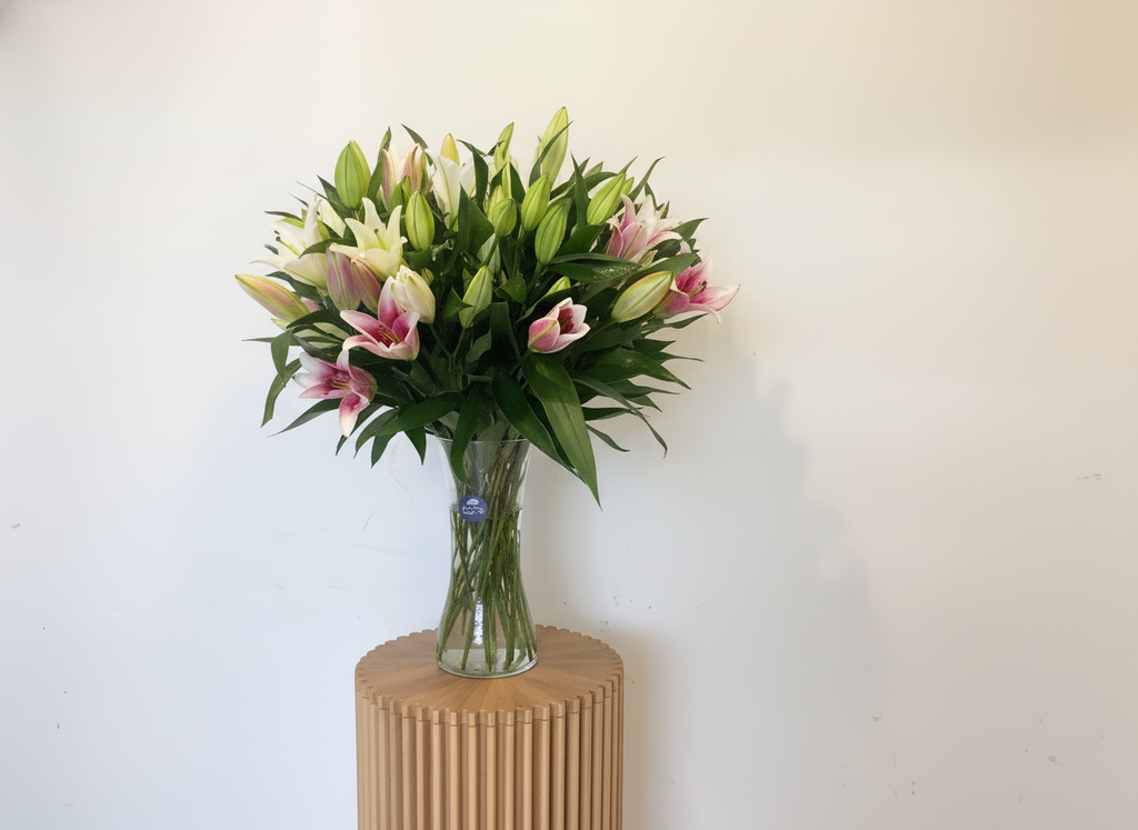 Pink and white lily bouquet side view