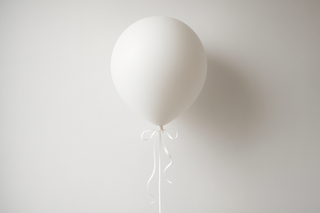 Single white helium balloon