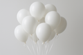 White helium balloons bunch